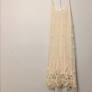 Embroidered above the knee dress